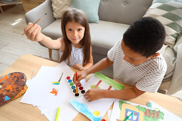 Sticker - Cute little children drawing at home