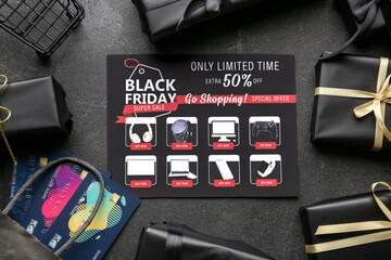 Sticker - Beautiful composition with catalogue for Black Friday and gift boxes on dark background