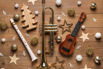 Poster - Composition with musical instruments and beautiful Christmas decorations on wooden background