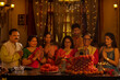 © IndiaPix - Indian family worshipping God at home on the occasion of Diwali