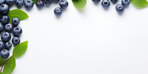 Wall Mural - Fresh blueberries with vibrant leaves angle border on a white background. Backdrop, copy space. Flat layout, banner. Healthy vegetarian lifestyle, vitamin organic food