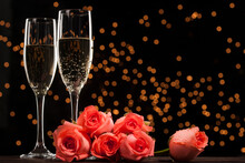 Champagne And Red Roses