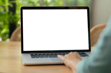 Wall Mural - Blank display screen monitor with women using laptop computer for advertise.