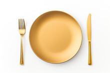 Top View An Empty Plate With Gold Spoon Fork And Knife Isolated On White Background