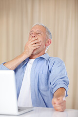 Poster - Mature man, laptop and yawn or tired, fatigue and burnout for challenge on technology. Male person, internet and exhausted for information, brainstorming and online research or plan and overworked