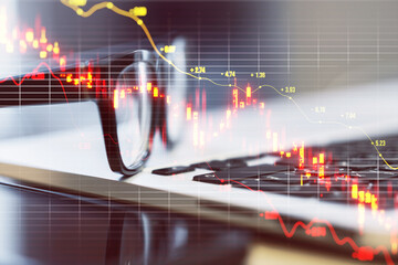 Poster - Close up of laptop keyboard and glasses with downward red candlestick forex chart with grid and index on blurry background. Crisis, falling stock market and recession concept. Double exposure.