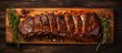 Top view of sliced chuck beef ribs on a wooden cutting board seasoned with hot rub for barbecue copy space image