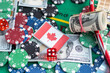 Online poker concept. Smartphone and poker chips on a green background. Poker online banner. Copy space. Vignette. Place for text. Gambling. Background