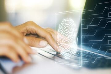Aufkleber - Double exposure of abstract creative fingerprint hologram with hands typing on laptop on background, protection of personal information concept