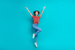 © deagreez - Full length photo of cheerful glad girl with raised arms dressed trendy clothes celebrate black friday isolated on cyan color background