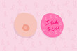 © Westend61 - Breast and phrase of strength to fight against cancer ribbon background
