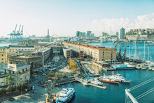 Italy, Liguria, Genoa, Boats In City Harbor