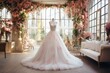 Elegant white wedding dresses hanging on hangers in luxury bridal shop boutique salon