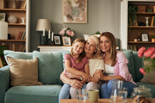 Three Female Generation Portrait At Home