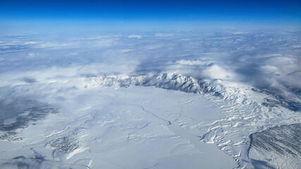 Enjoying the mountainous and snowy landscape of the U.S. state of Nevada from the window of a wonderful plane that took off from the city of Las Vegas.