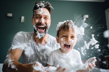 Cheerful father and son playing with foam at home in the morning