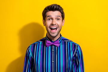 Sticker - Photo of impressed man with stubble dressed striped shirt tie bow astonished staring at sale isolated on vivid yellow color background