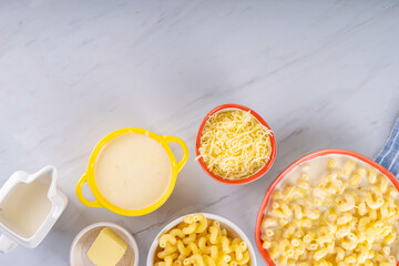 Wall Mural - Creamy mac and cheese with ingredients for cooking