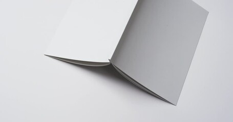 Canvas Print - Video of book with white blank cover pages and copy space on white background