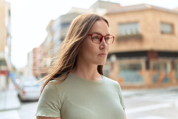 Sticker - Young beautiful woman wearing glasses at street