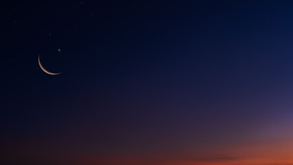 Wall Mural - crescent moon on dark blue twilight sky end of day well space for text religion of islamic ramadan k