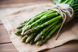Bunch of fresh ripe asparagus closeup. Generative AI