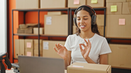 Poster - African american woman ecommerce business worker having video call at office