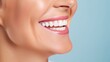 © masyastadnikova - Beautiful elder woman's smile with healthy white, straight teeth close-up on light background with space for text