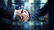 © N.Coleman - Two businesspeople shaking hands against abstract glowing polygonal background.Partnership concept. Handshake of businessmen in a suit. Successful negotiating business concept.