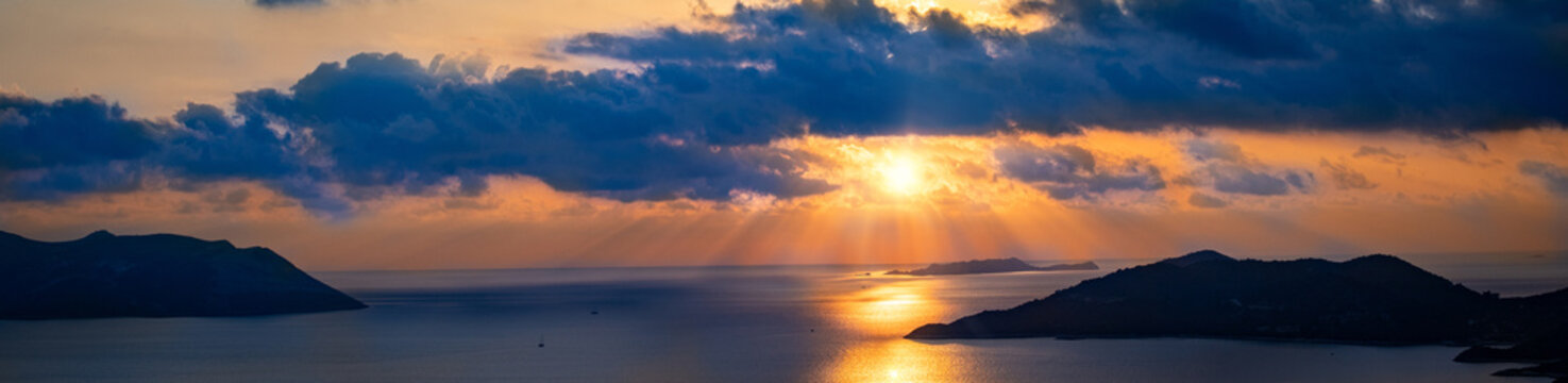 Sunset view in the mediterranean sea between Greece and Turkey. Left side is Megisti island and right side is Kaş Antalya. 