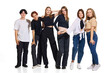 © master1305 - Group of diverse young attractive girls, teenagers in casual outfit stands in line against white studio background. Concept of beauty, youth, emotions, fashion, style, modelling. Copy space for ad.