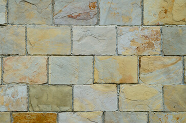 Wall Mural - New colorful stone wall closeup