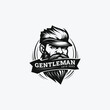 Stylish barber shop logo featuring a dashing man with a beard and mustache.Barbershop vintage logo 