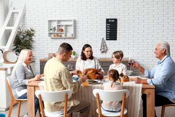 Poster - Happy family having dinner at festive table on Thanksgiving Day