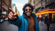 Afroamerican man with cool style glasses and modern pointing with finger at an online promotion offer discount or sale
