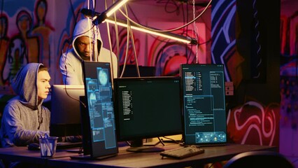 Poster - Malicious computer specialists in secret abandoned warehouse working together to get past anti tamper measures implemented by companies to protect their software, uploading crack to torrent websites
