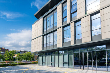 Poster - Modern urban business building on a sunny day