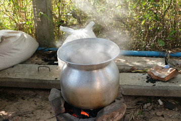 Cook Sticky rice with pot and rice steamer, asian cultural for cooking steaming.