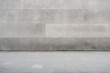 concrete gray wall on street city, paving stones, flat facade, mockup background for creativity, empty.