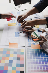 business teamwork and working with ux developer and ui designer at table in modern office. creative 