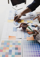 Business teamwork and working with UX developer and UI designer at table in modern office. Creative and development agency concept.