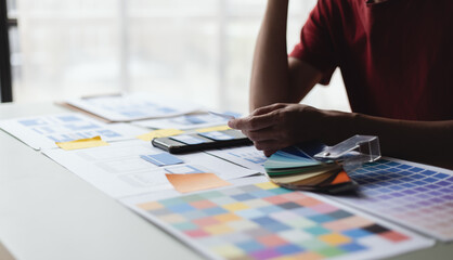 Business teamwork and working with UX developer and UI designer at table in modern office. Creative and development agency concept.