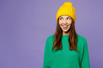 Sticker - Young cheerful fun cool woman she wear green sweater yellow hat casual clothes look aside on area mock up copy space isolated on plain pastel light purple background studio portrait Lifestyle concept