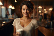 Break pause during work concept. Portrait of friendly female woman happy lady for social media, inside cafe or restaurant with eco paper cup tea coffee drink smiling in camera, crowd on background