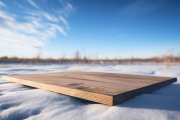 Poster - Wooden board on snow with blue sky background. Mock up for design presentation product or montage. High quality photo