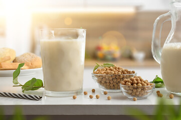 Wall Mural - Vegetable soy drink in a glass on the kitchen bench