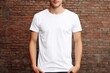 White blank t shirt mock up. Men on wall background