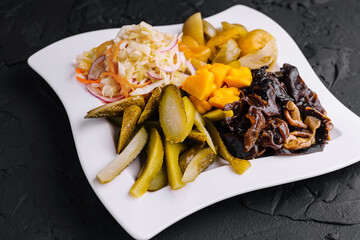 Wall Mural - Marinated salty vegetables in the plate