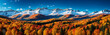 Beautiful panorama of autumn alpine mountains and forest in the foreground. Generative ai.