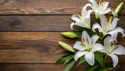 Wall Mural - white lily flowers on wooden background top view with copy space funeral concept